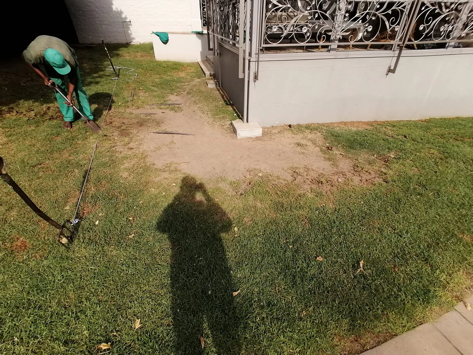 Freshly laid lawn being raked level